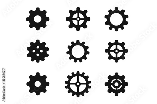 Collection of nine black cogwheel symbols for settings and industrial technology