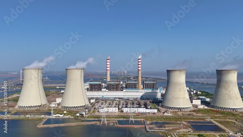 A time-lapse aerial view of the power plant located by the coast of Tianjin