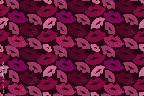 Dense, striking seamless pattern featuring layers of kiss prints and lips in a rich palette of deep pinks, reds, and purples on a dark background, perfect for bold fashion and beauty prints.