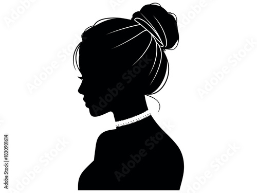A silhouette of a woman wearing a pearl necklace and her hair styled in a bun.