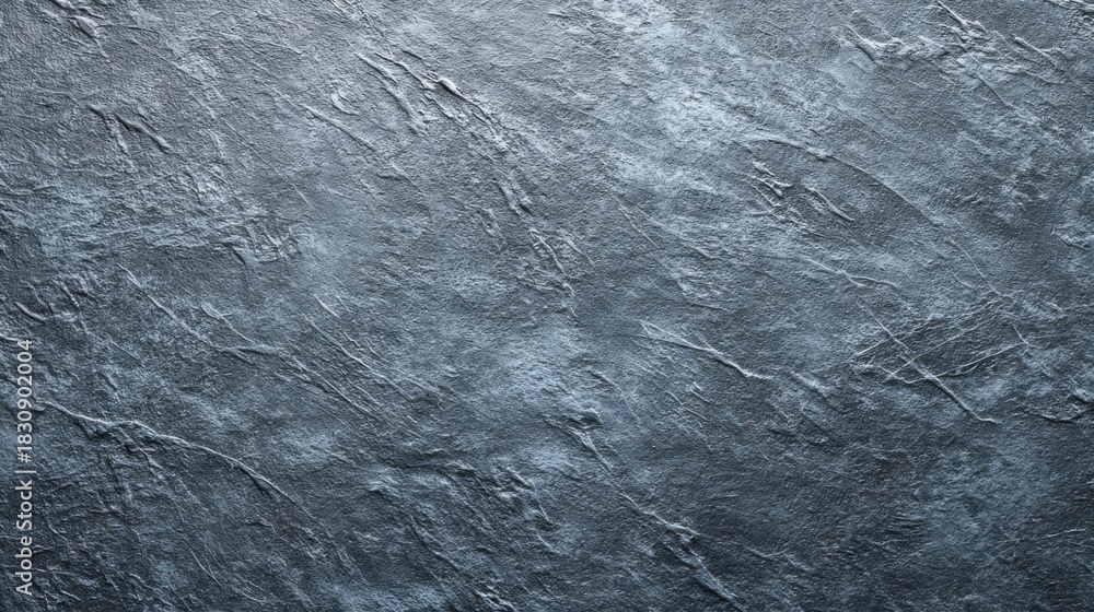 Obraz premium Textured dark slate background with subtle highlights