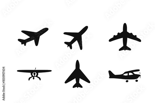 Set of six distinct black aircraft silhouettes including passenger jets, propeller planes, and fighter jets