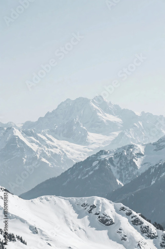 A mountain range covered with white snow, Picture. Morning sunlight. Winter mountains.
