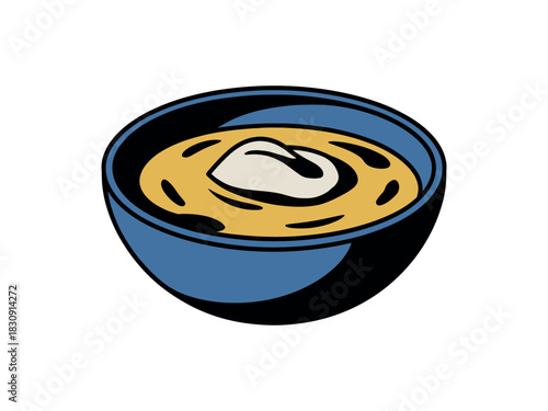A simple blue bowl contains a warm serving of hearty soup topped with a dollop of creamy garnish.