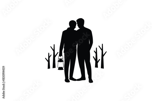 Silhouette of a couple embracing in a forest with lantern