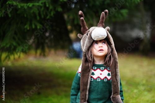 Toddler girl in deer hat