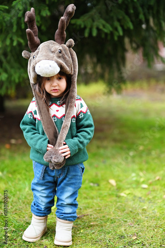 Toddler girl in deer hat