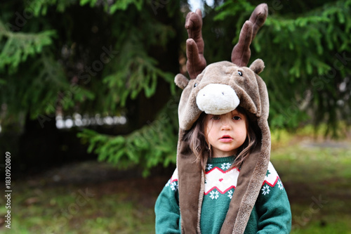 Toddler girl in deer hat