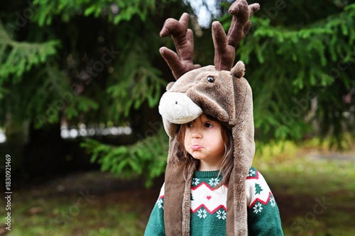 Toddler girl in deer hat