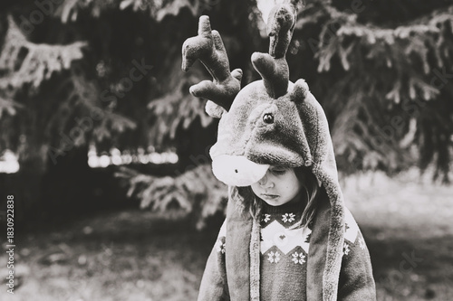 Toddler girl in deer hat