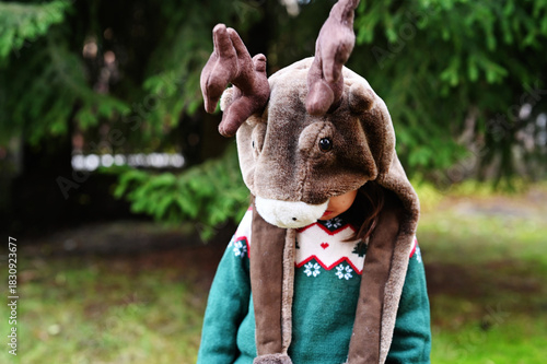 Toddler girl in deer hat