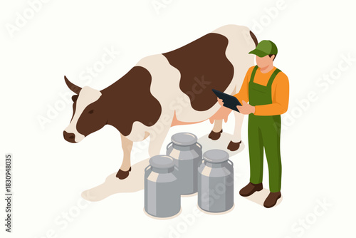 Hardworking farmer using digital tablet milking cow for fresh organic dairy production in rural countryside setting on farm