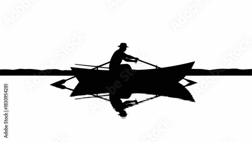 Silhouette of a person rowing a boat on calm water.