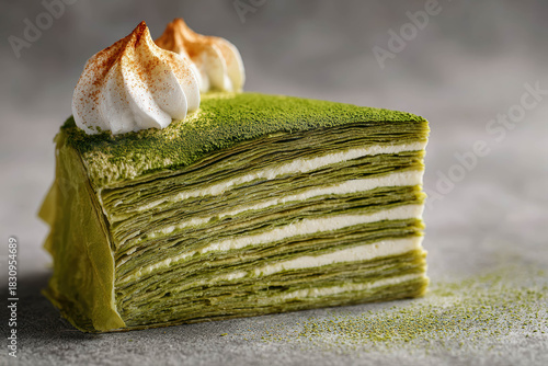 Slice Of Green Matcha Mille Crepe Cake Topped With Whipped Cream And Cinnamon On Grey Background Matcha Mille Crepe Cake Slice