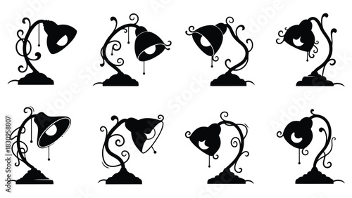Ornate whimsical black silhouette table lamps with elegant swirling vine like stands and decorative dripping, isolated on white background