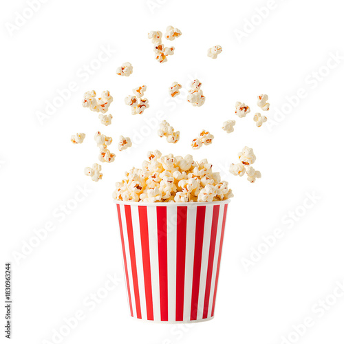 Fresh Popcorn Spills From a Striped Container in a Playful Kitchen Setting Du...