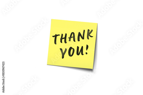 Thank You Handwritten Post-It Note On Yellow Sticky Pad With Gratitude Message