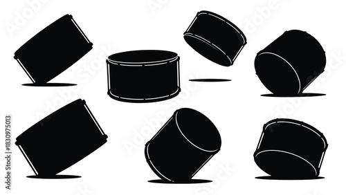 Collection of black silhouette drum icons showing various angles and perspectives of percussion instruments for musical, isolated on white background