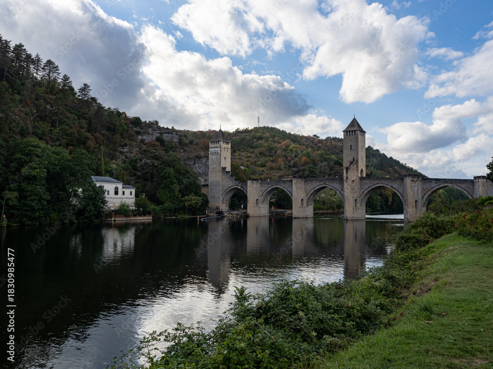 Fototapeta premium View of the Valentrén bridge, in the medieval city of Cahors, over the Lot River. Lot Valley, Ocitanie Region, France.