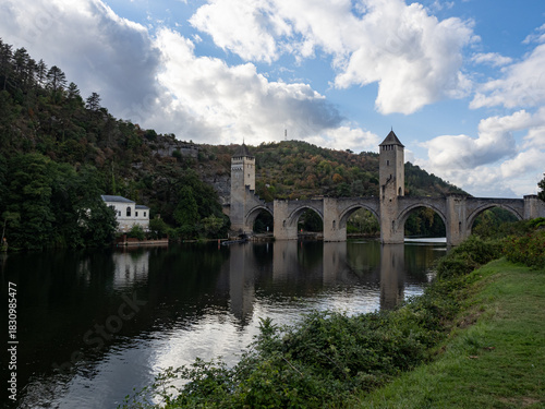 View of the Valentrén bridge, in the medieval city of Cahors, over the Lot River. Lot Valley, Ocitanie Region, France.