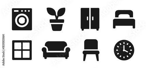 Home and interior icon collection in black. Includes washing machine, plant pot, wardrobe, bed, window, sofa, chair and wall clock. The icons are simple, bold, and clear for universal household use