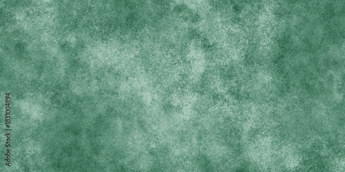 Abstract Elegant dark green background with mottled vintage texture in old fancy background design, texture of colored parchment paper.	