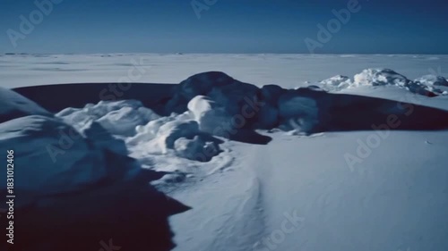 Unseen UFO Casting Distorted Moving Shadow on Arctic Snowfield