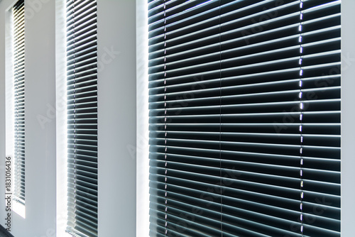 Closed Window Blinds With Horizontal Slats In Bright Modern Interior