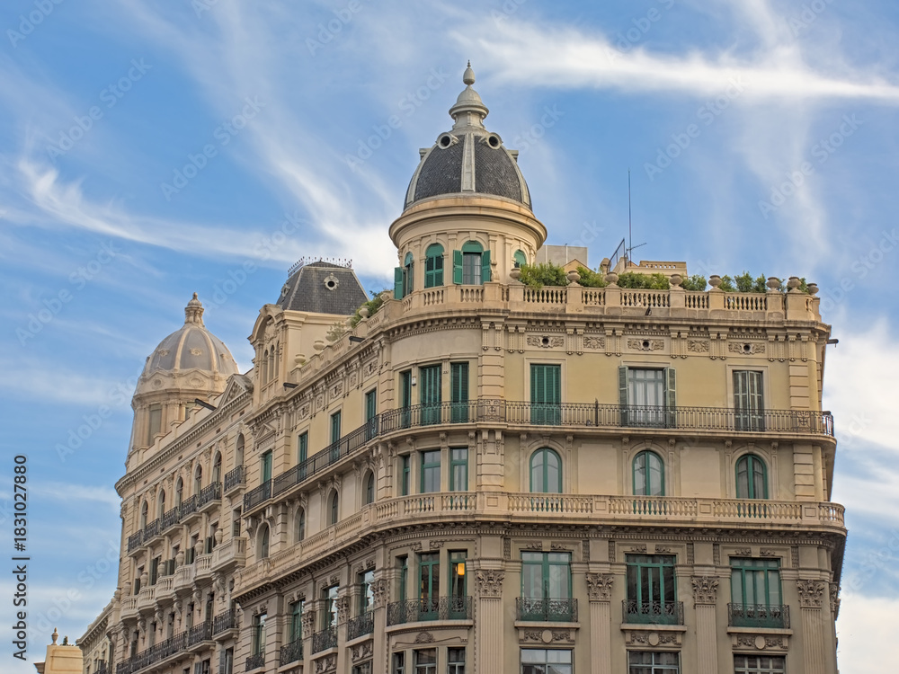 Obraz premium Facade of an ornate neoclassical apartment building in Barcelona, Catalonia, Spain 