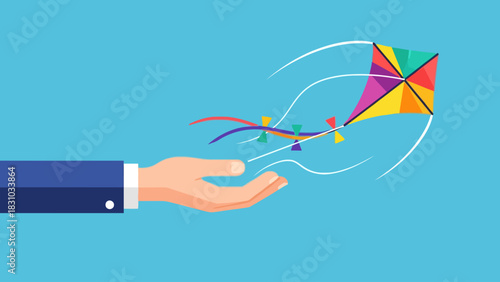 A hand in a suit sleeve releases a colorful kite