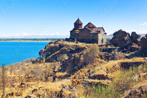 View of Lake Sevan and medieval Armenian monastery - Hayravank. Gegharkunik Province, Armenia