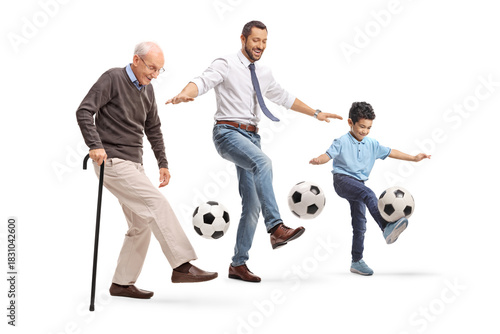 Grandfather, father and son juggling with footballs