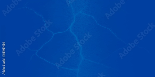 Blue light energy creates a clear, seamless ripple pattern on the water's surface, reflecting the electric blue sky background