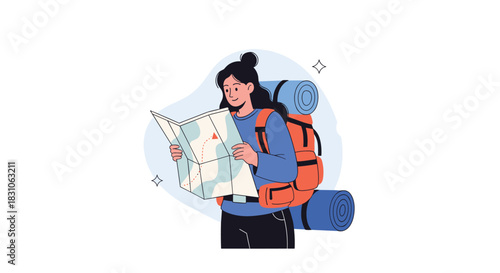 Female backpacker holding and carefully reading a paper map planning her outdoor adventure and travel route.