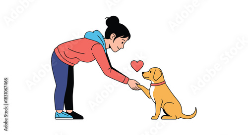 Young woman shows love and affection to her golden retriever dog by bending down and gently holding its paw in her hand.
