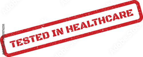 A red grunge rubber stamp displaying TESTED IN HEALTHCARE in capital letters within its rectangular border, signifying medical industry validation