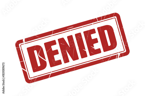 A red and white rubber stamp with the word denied written on it on a white background