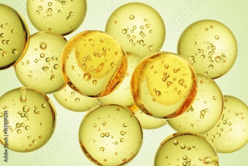 Golden translucent spheres with suspended micro air bubbles, forming a refined abstract composition suitable for wellness advertising, beauty product showcases, and futuristic design concepts