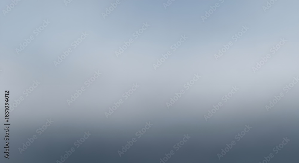 Obraz premium Misty horizon over a calm blue body of water