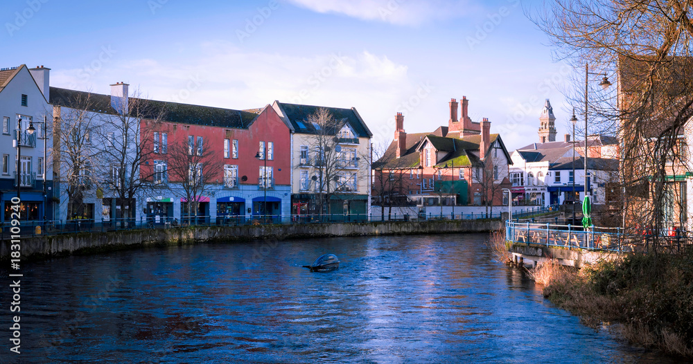 Naklejka premium Sligo city skyline over the Garavogue River in Connacht Province, Ireland at sunset
