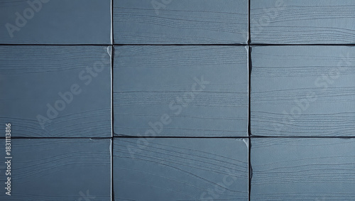 Textured blue wooden panels in grid arrangement