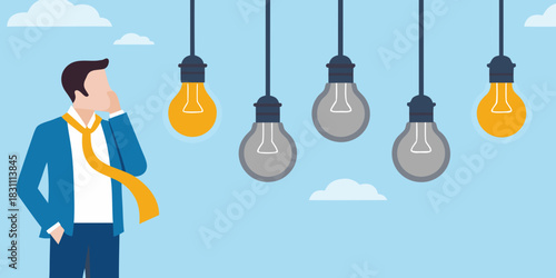 Businessman contemplating ideas represented by glowing and unlit light bulbs