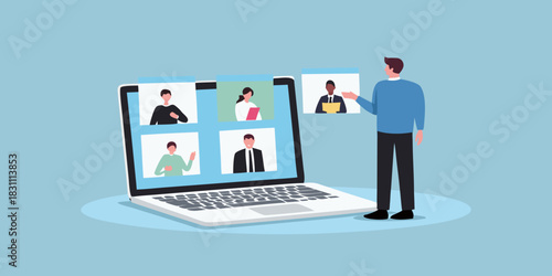Man participating in a video conference call with colleagues on a laptop