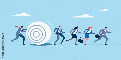 Diverse business team working together to push a large rolling target forward