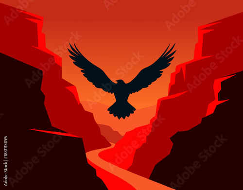Eagle flying over canyon