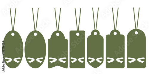 Seven green tags with different shapes and bow cutouts hanging from strings