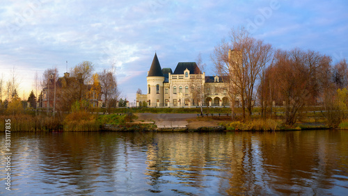 A beautiful view from the Volga River of Ponizovkin Castle on a clear autumn day. The castle with bay windows and towers.