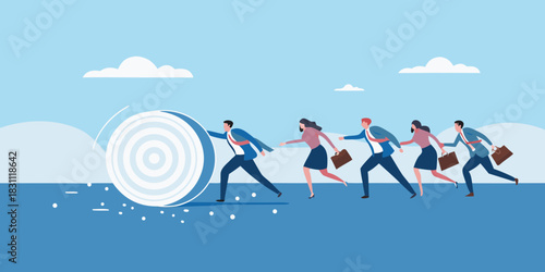 Business people running behind a large rolling target