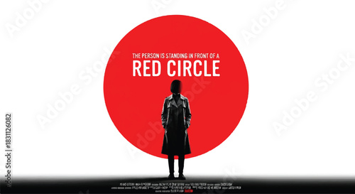 Silhouette of a person standing in front of a large red circle.
