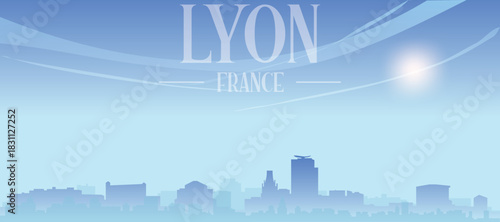 Blue panoramic poster of the city skyline with misty background buildings and clouds of LYON, FRANCE